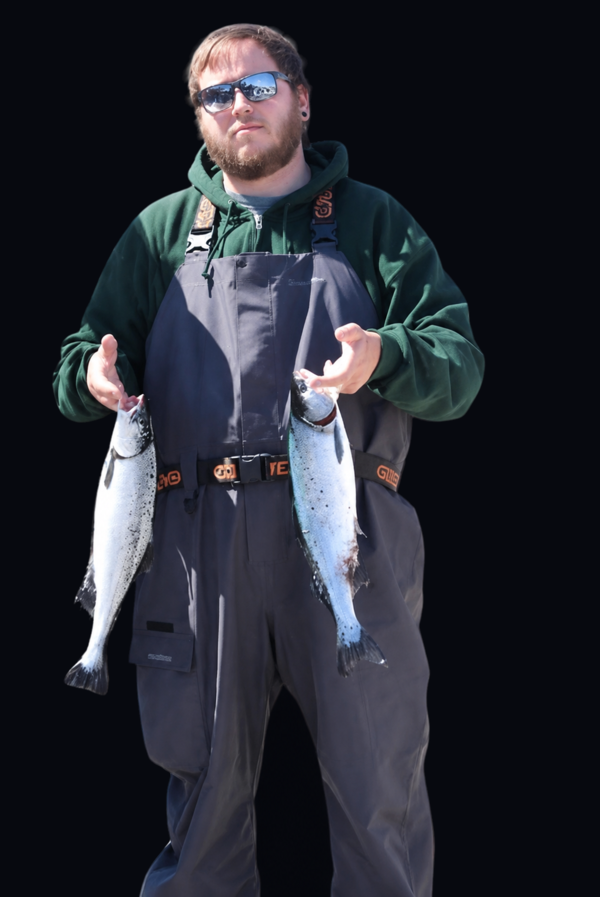 Joey Stout holding two fish